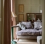 As Seen in Our Brochure June 2024: Helmsley 3 Seater Sofa in Manhattan Acorn with Seat and Back Cushions in RHS Botanicals Ferns Toile Bark with contrasting piping