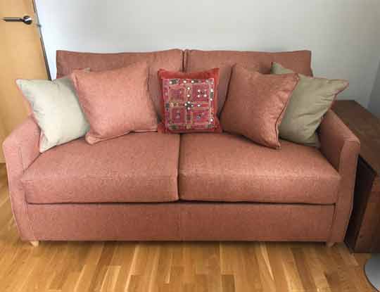 2 seater orange sofa