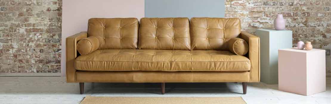 large rust sofa in modern living room
