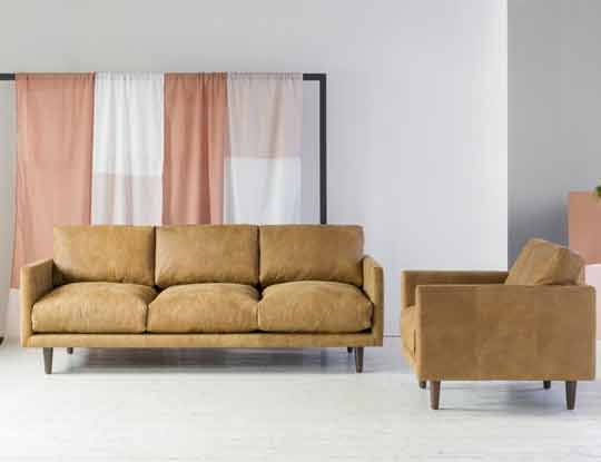 rust-sofas-in-lounge-suite