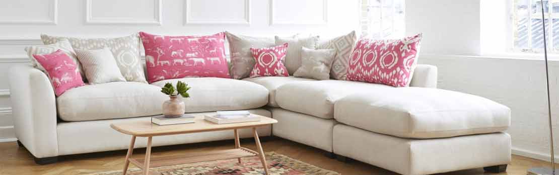 large white corner sofa in living room