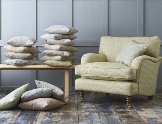 Yellow armchair in patterned fabric