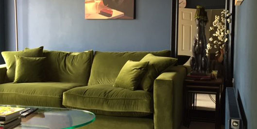 green velvet chesterfield sofa
