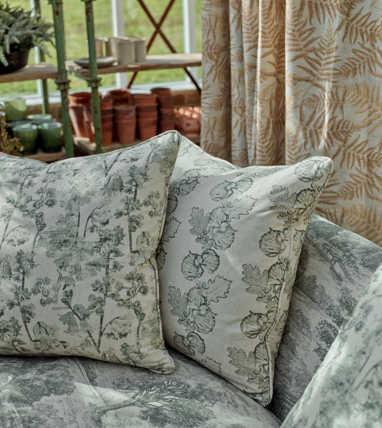 Scatter cushions in Woodland Flora Forest Green and Coppice Stripe Forest Green