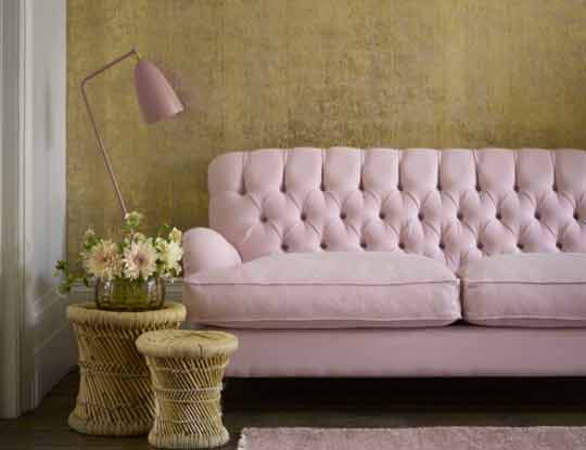 plain sofa in pink fabric in a living room